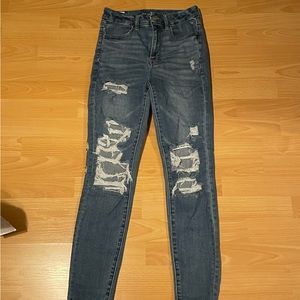 American eagle blue skinny jeans with rips
